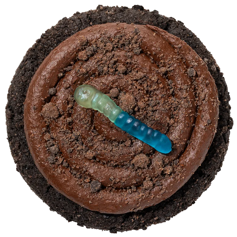Crumbl Dirt Cake Cookie with fudge frosting, cookie crumbs and a gummy worm